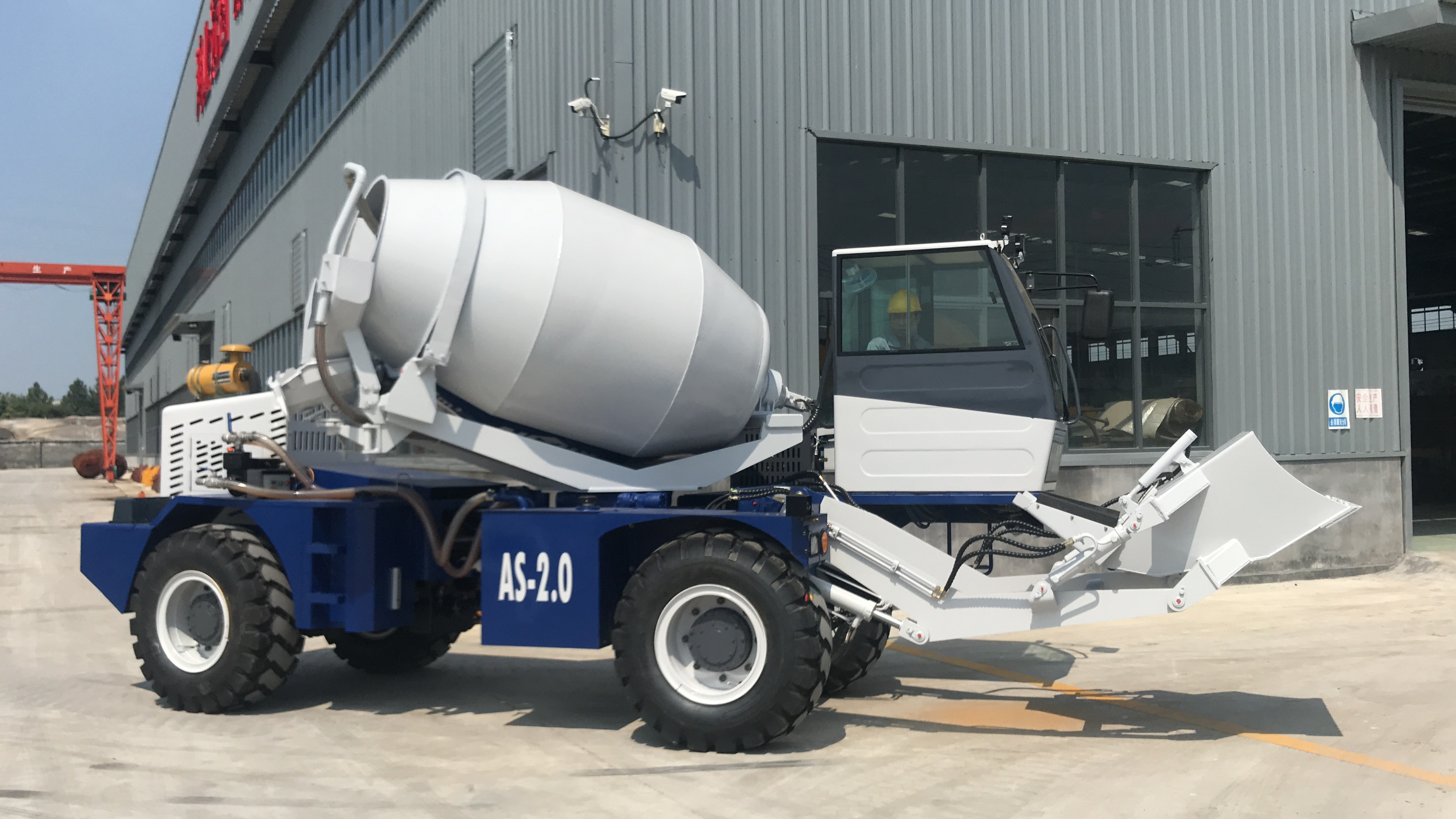 Self Loading Concrete Mixer —